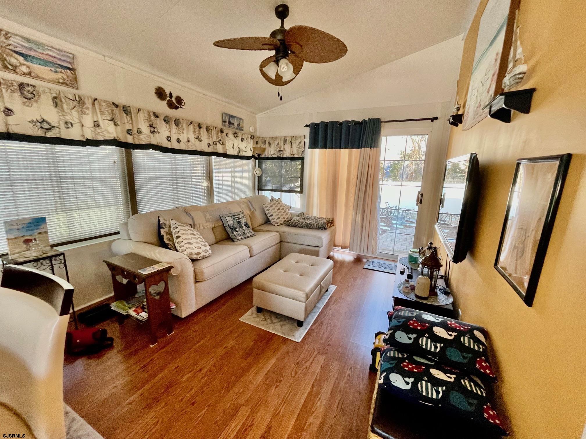 4100 Rte 9 South, Unit 19 Rio Grande, NJ 08242 - Photo 5 of 23 a living room with furniture and a flat screen tv