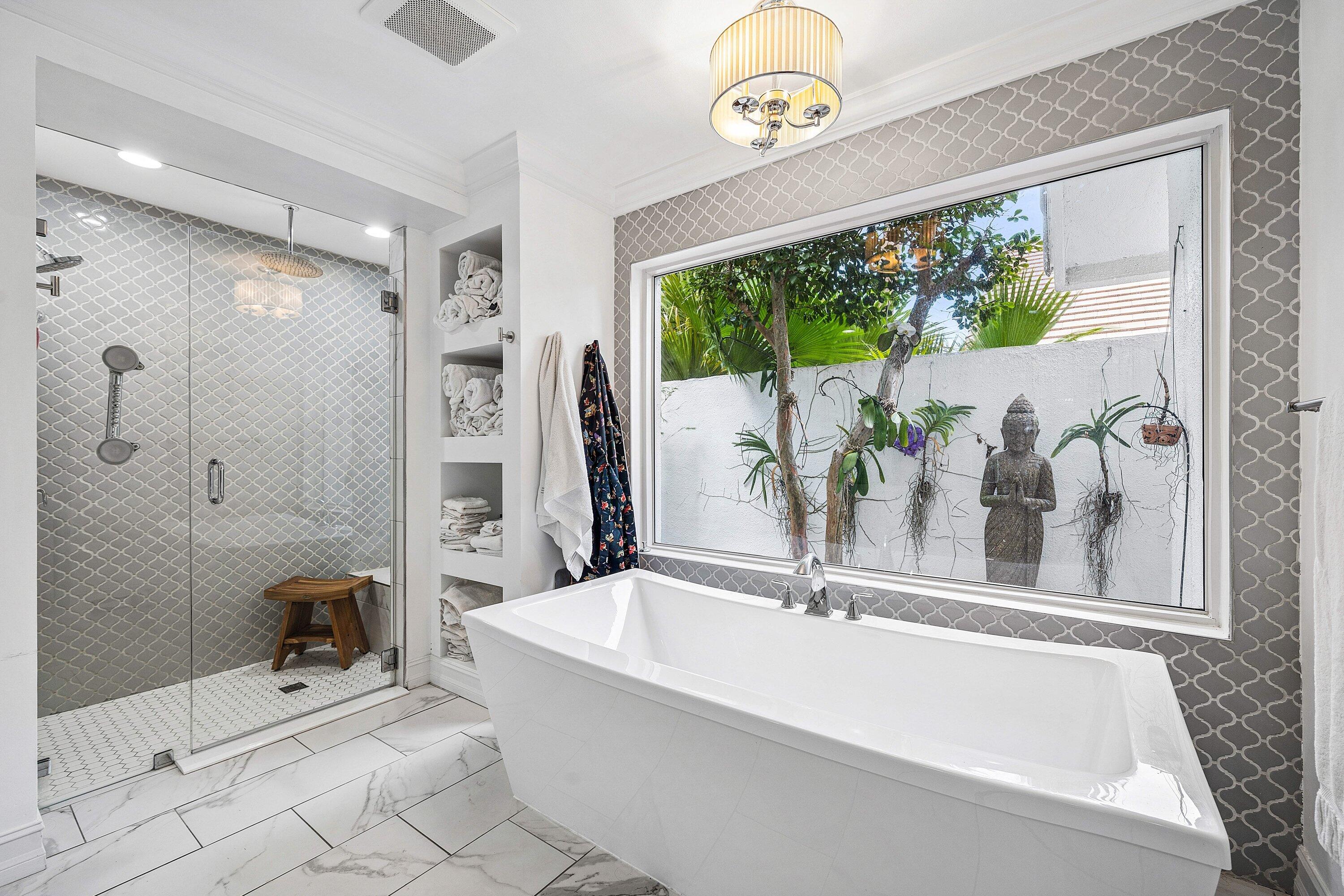 3030 Canterbury Drive Boca Raton, FL 33434 - Photo 24 of 45 a bath tub sitting next to a window