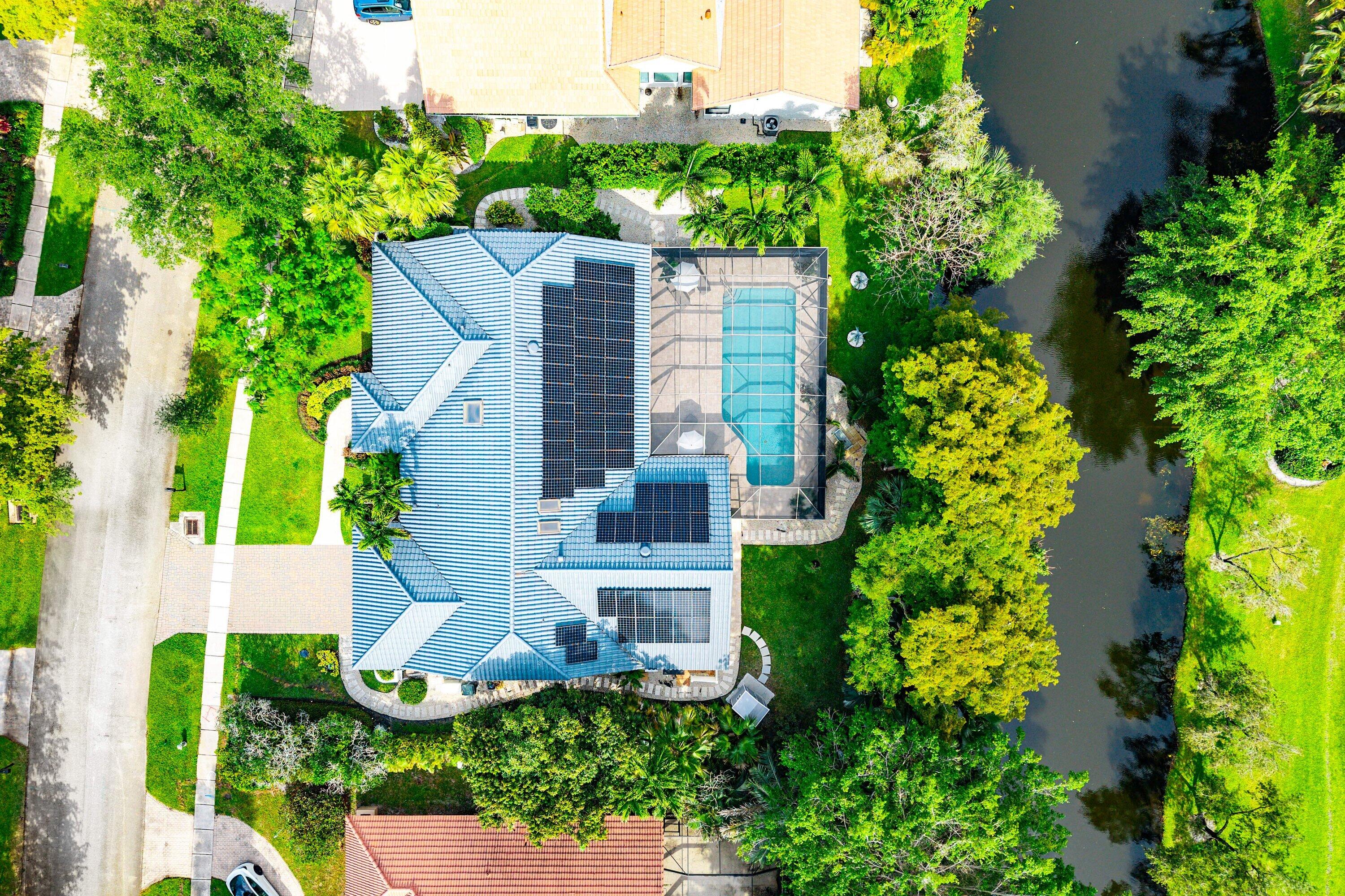 3030 Canterbury Drive Boca Raton, FL 33434 - Photo 3 of 45 an aerial view of a house