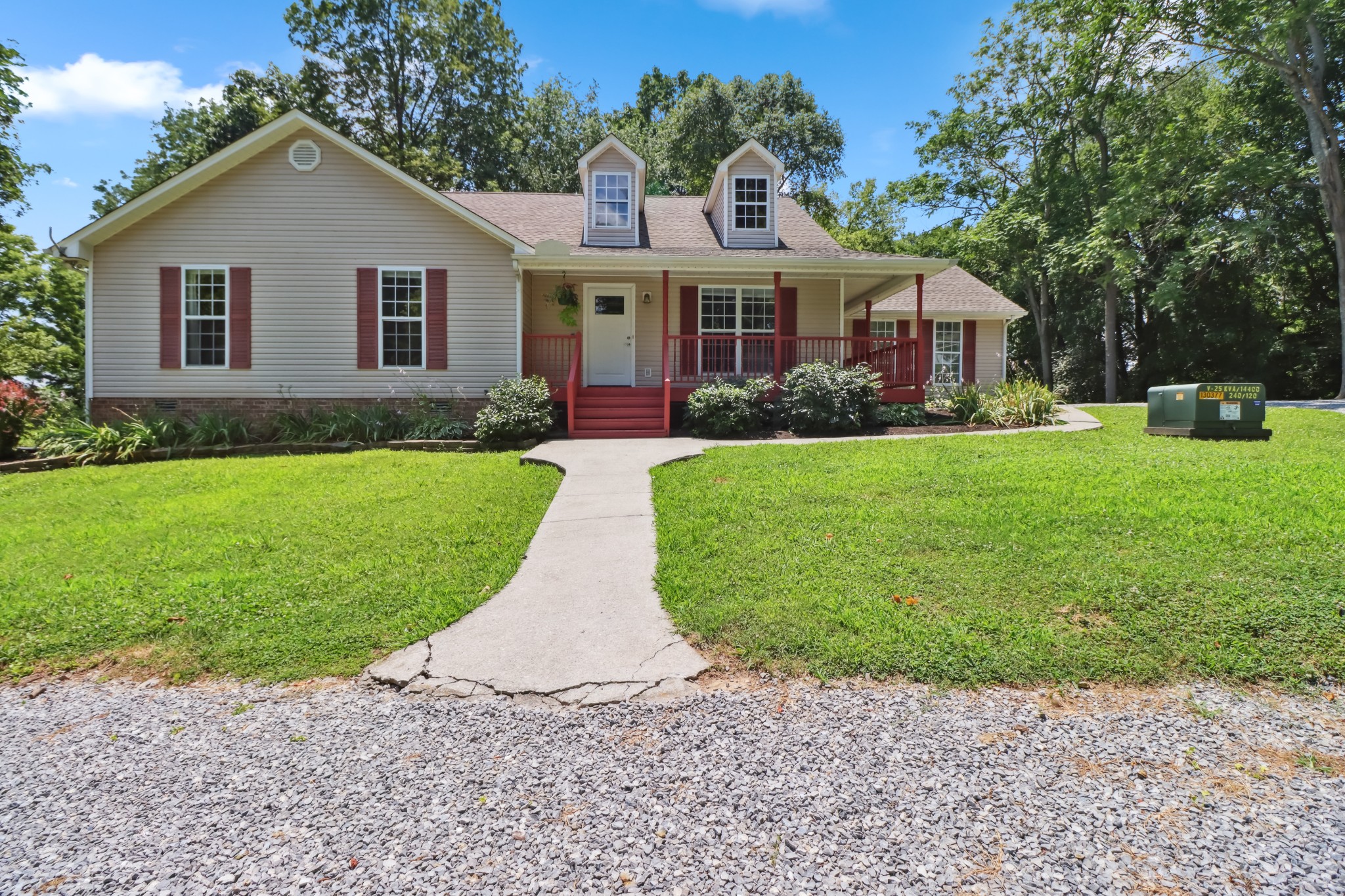 4956 Minnis Road Springfield, TN 37172 - Photo 1 of 32 a front view of a house with a yard and garage