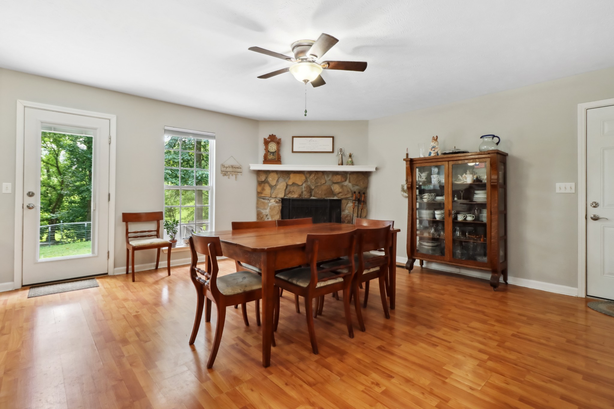 4956 Minnis Road Springfield, TN 37172 - Photo 20 of 32 a view of a dining room with furniture window and wooden floor