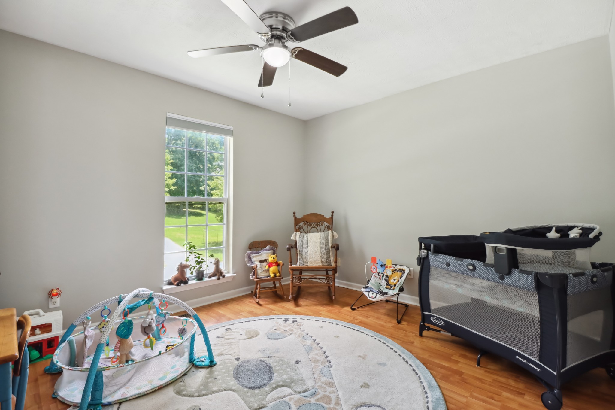 4956 Minnis Road Springfield, TN 37172 - Photo 28 of 32 a room with furniture and a chandelier