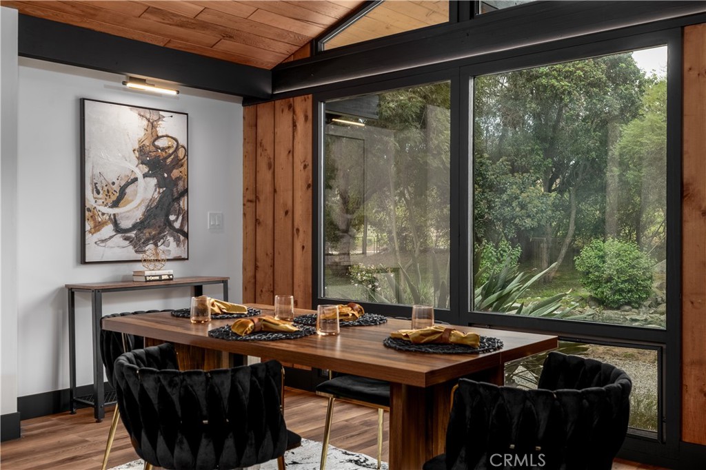 7744 West Lilac Road Bonsall, CA 92003 - Photo 25 of 60 a view of a patio with table and chairs