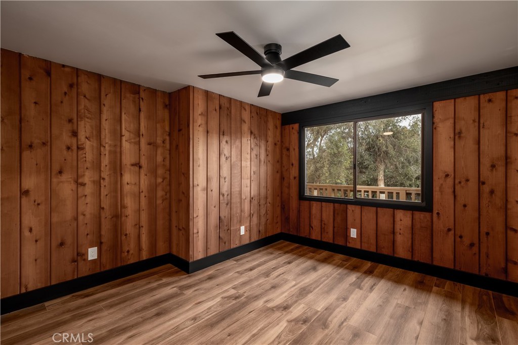 7744 West Lilac Road Bonsall, CA 92003 - Photo 28 of 60 a view of a room with wooden walls and windows