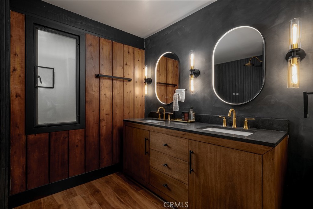 7744 West Lilac Road Bonsall, CA 92003 - Photo 30 of 60 a bathroom with a sink and a mirror