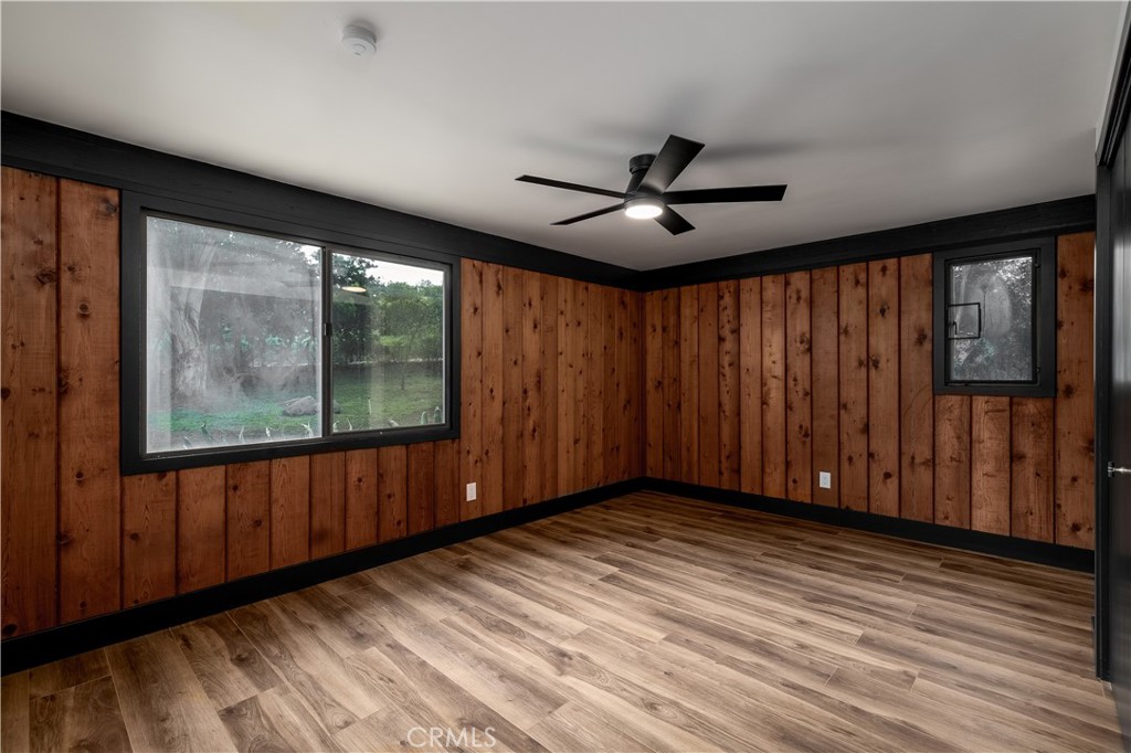 7744 West Lilac Road Bonsall, CA 92003 - Photo 31 of 60 wooden floor in an empty room with a window