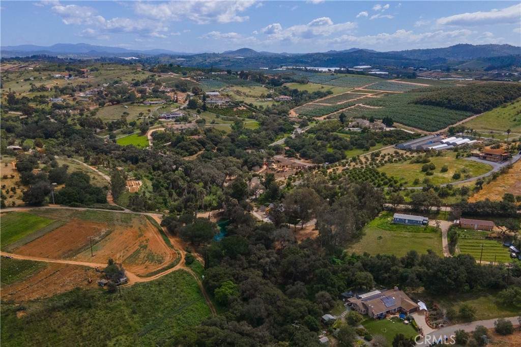 7744 West Lilac Road Bonsall, CA 92003 - Photo 54 of 60 an aerial view of residential houses with outdoor space and city view