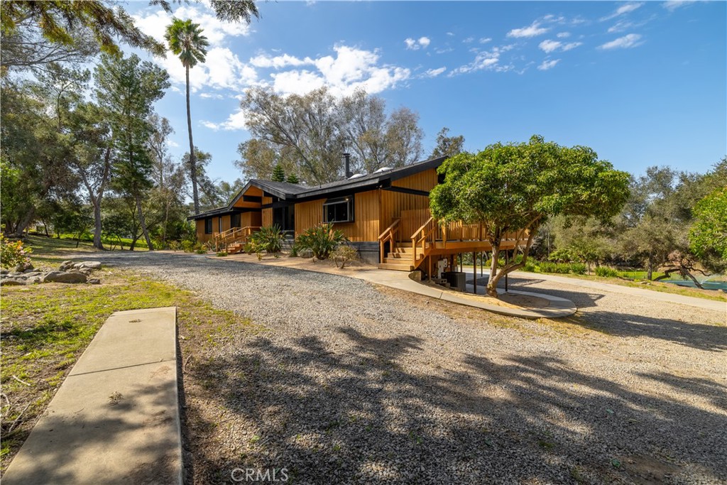 7744 West Lilac Road Bonsall, CA 92003 - Photo 59 of 60 a view of a street with houses