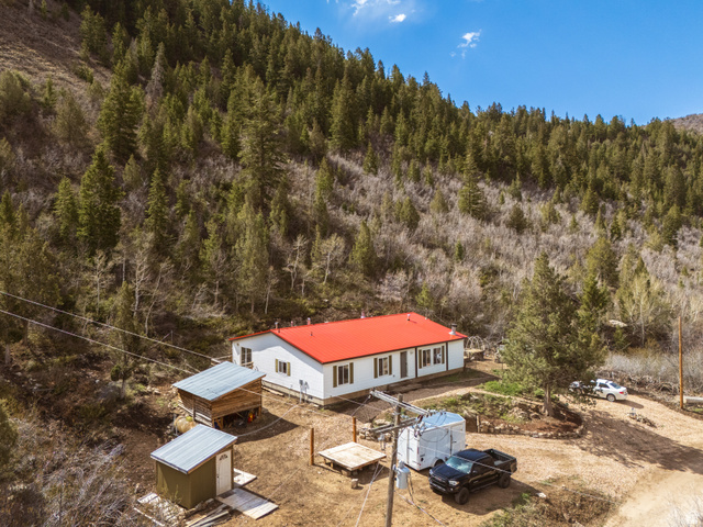 3902 Beaver Creek Road Kamas, UT 84036 - Photo 26 of 33 Aerial view of property with red metal roof