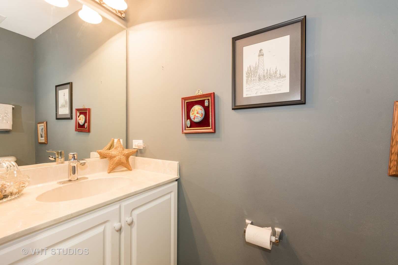 3132 Raphael Court St. Charles, IL 60175 - Photo 12 of 14 a bathroom with a sink and a mirror