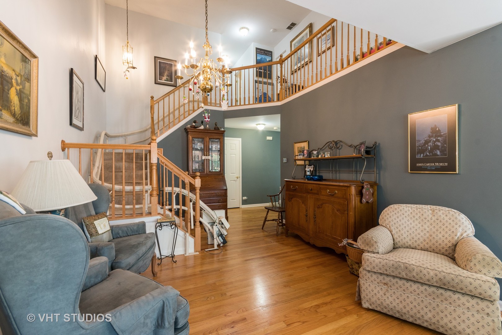 3132 Raphael Court St. Charles, IL 60175 - Photo 4 of 14 a living room with furniture and stairs with wooden floor