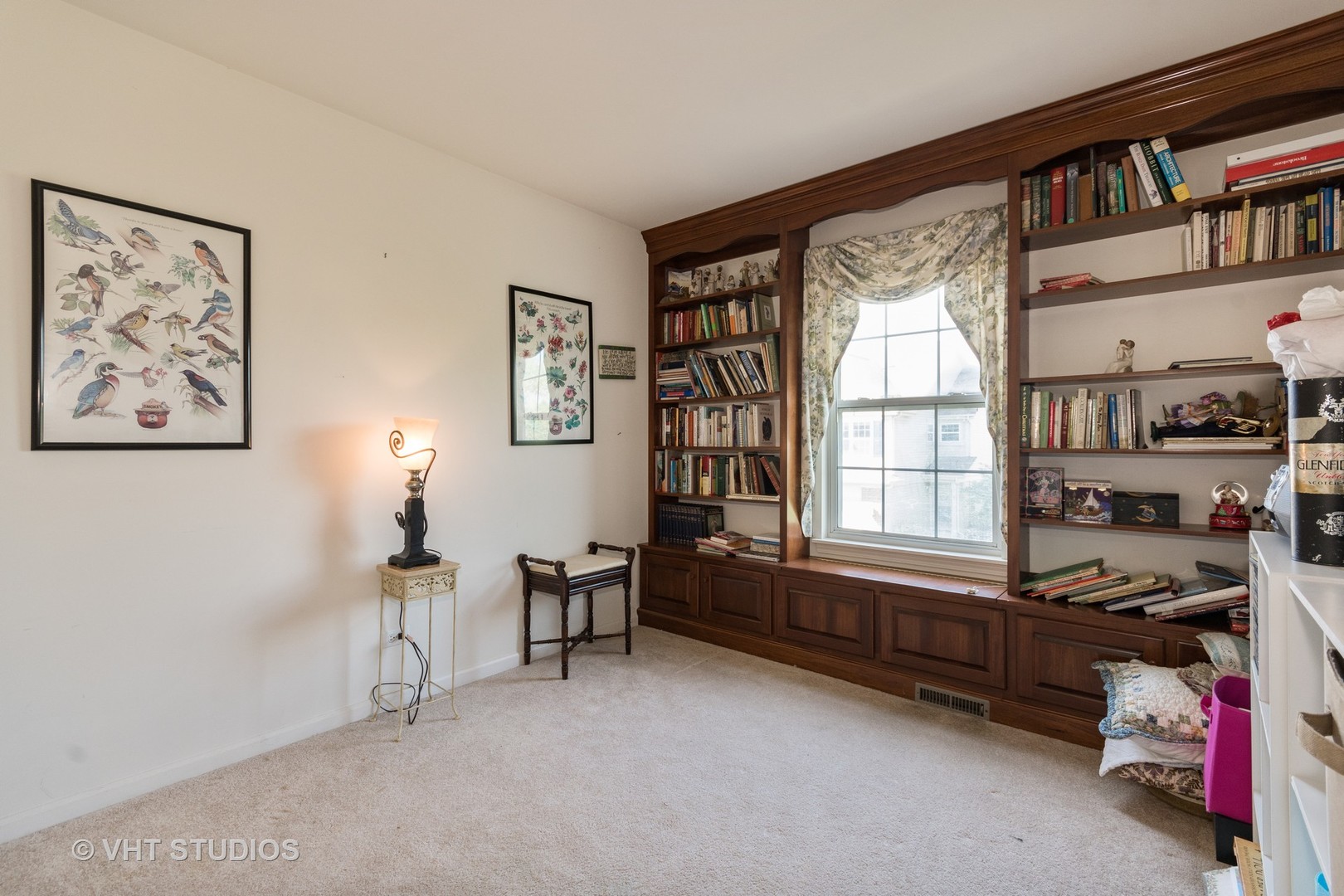 3132 Raphael Court St. Charles, IL 60175 - Photo 9 of 14 a livingroom with window and lounge chair