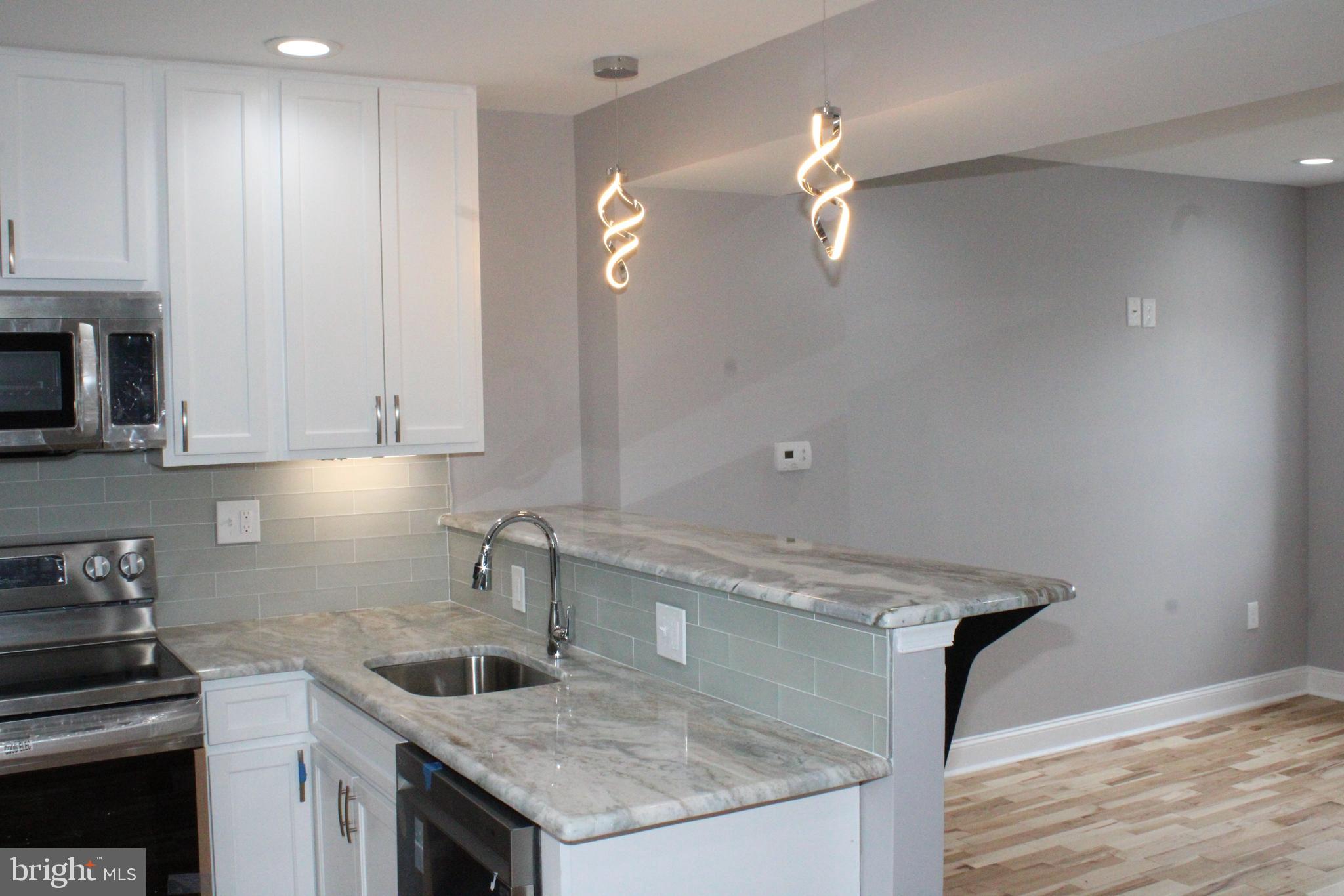 1002 Cameron Road Baltimore, MD 21212 - Photo 10 of 53 The undercabinet lighting is so impressive.