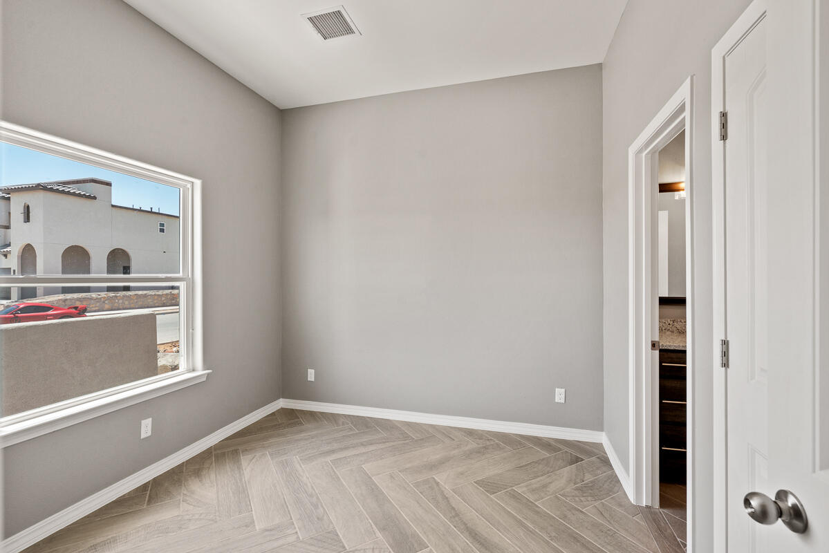 6026 Spring Ridge Sunland Park, NM 88008 - Photo 12 of 17 wooden floor in an empty room