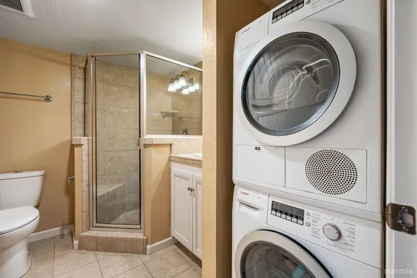 a bathroom with a toilet and a sink