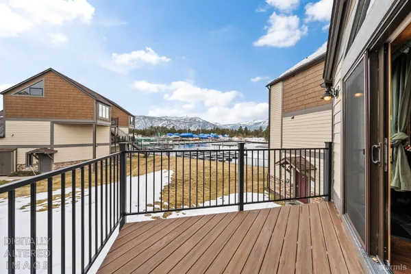 a view of livingroom with glass door and furniture