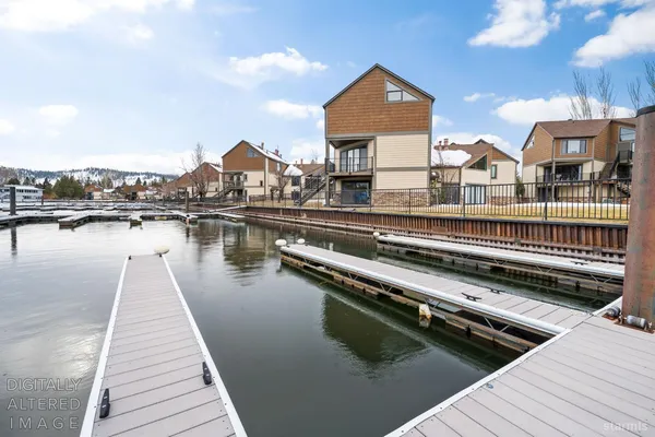 a view of residential houses with outdoor space