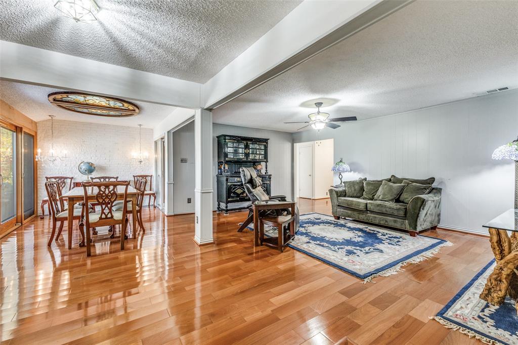 2271 Homeway Circle Dallas, TX 75228 - Photo 6 of 17 a living room with furniture and wooden floor
