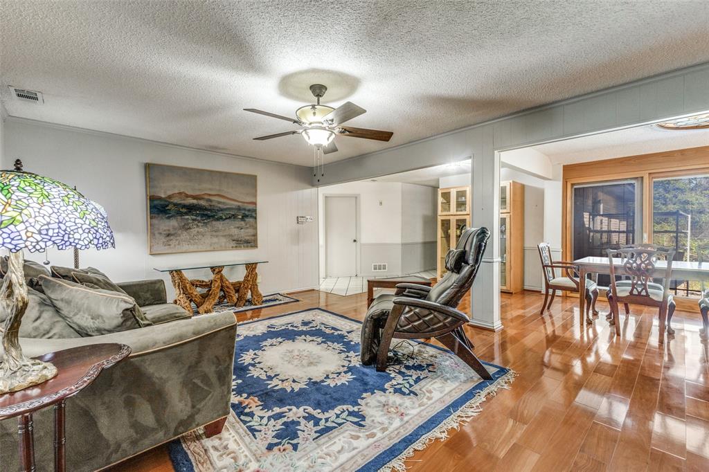 2271 Homeway Circle Dallas, TX 75228 - Photo 7 of 17 a living room with furniture and a large window