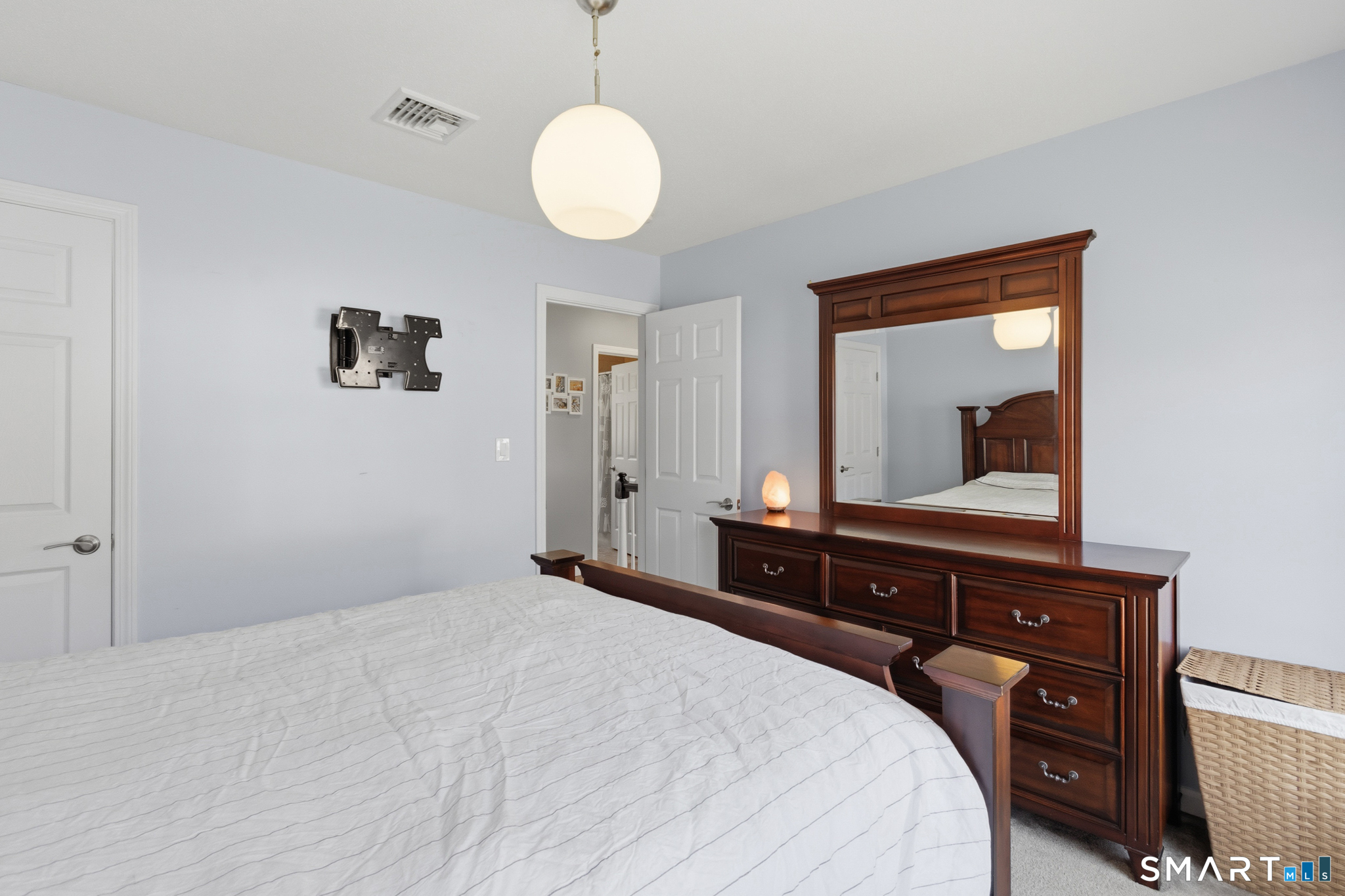 5 Ice Pond Road Granby, CT 06035 - Photo 22 of 40 a bedroom with a bed and a dresser