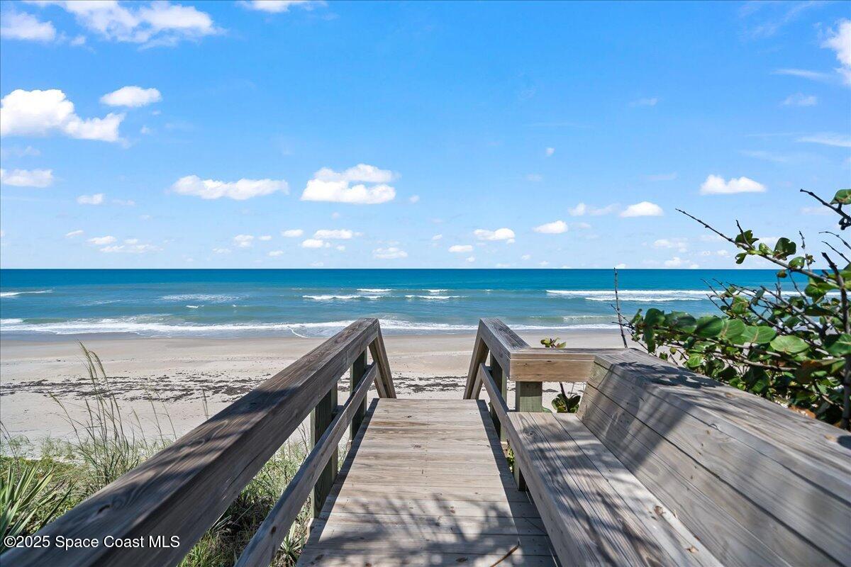 5525 Jimmy Buffett Mem Highway Melbourne Beach, FL 32951 - Photo 4 of 56 a view of roof deck with ocean and city view