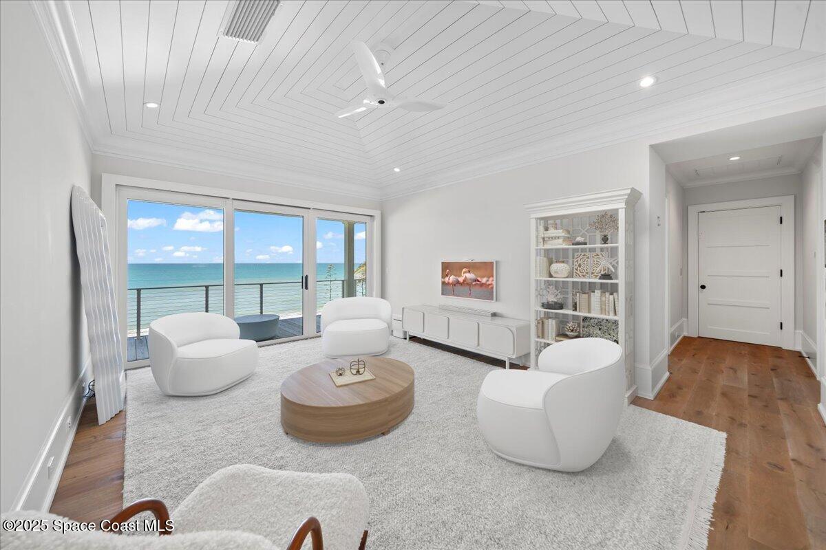 5525 Jimmy Buffett Mem Highway Melbourne Beach, FL 32951 - Photo 56 of 56 a living room with furniture and a large window