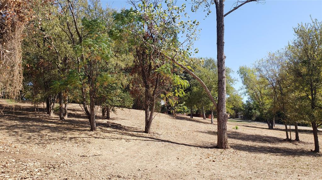 Tbd Canyon Ridge Drive Waco, TX 76705 - Photo 13 of 18 a view of a road with a tree in the background