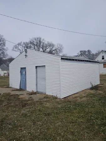 a view of a house with a garage