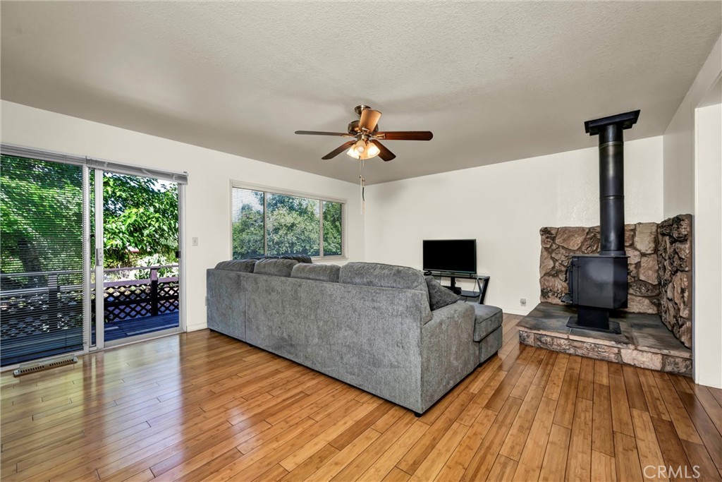 16927 Greenridge Road Hidden Valley Lake, CA 95467 - Photo 11 of 25 a living room with furniture and a large window