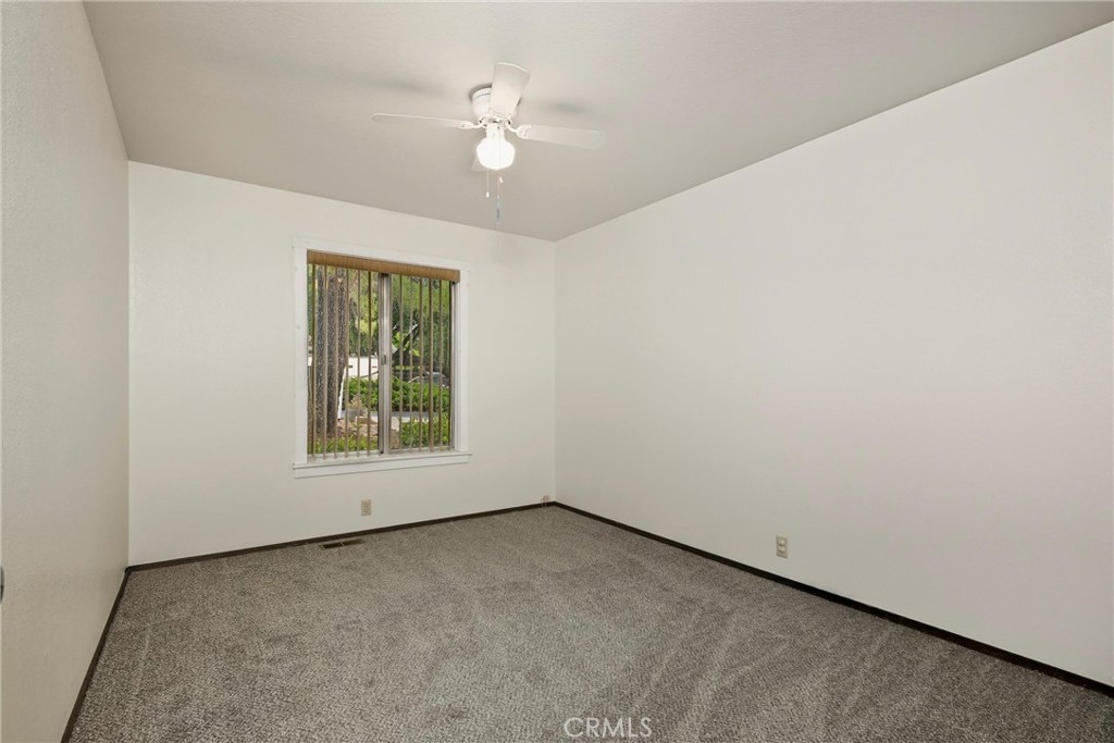 16927 Greenridge Road Hidden Valley Lake, CA 95467 - Photo 12 of 25 an empty room with a window