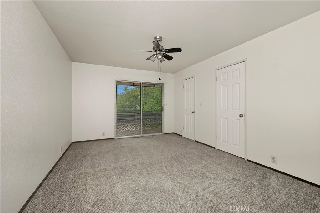 16927 Greenridge Road Hidden Valley Lake, CA 95467 - Photo 16 of 25 an empty room with windows