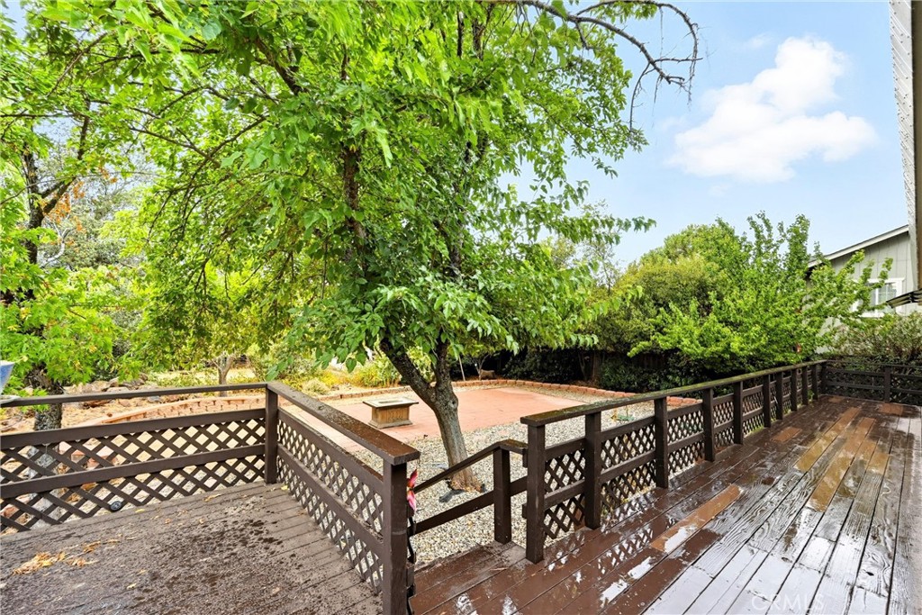 16927 Greenridge Road Hidden Valley Lake, CA 95467 - Photo 18 of 25 a view of backyard with a deck and wooden floor