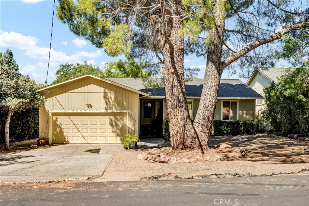 16927 Greenridge Road Hidden Valley Lake, CA 95467 - Photo 24 of 25 a front view of a house with a yard