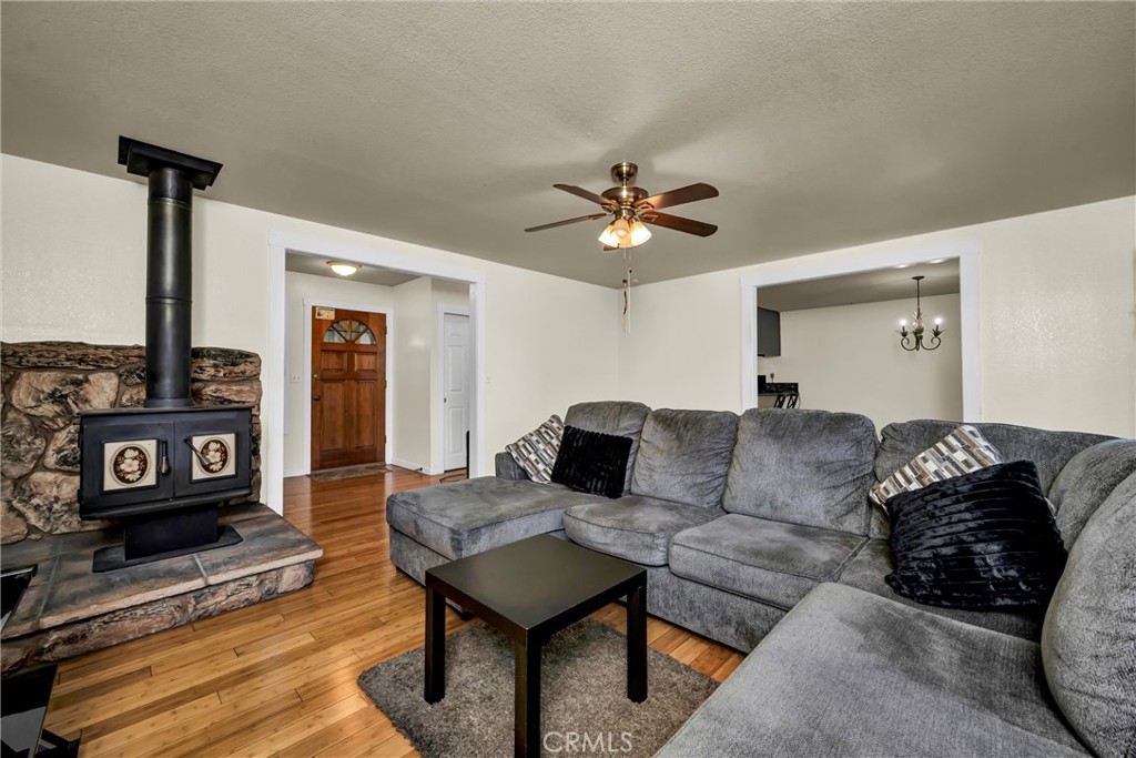 16927 Greenridge Road Hidden Valley Lake, CA 95467 - Photo 10 of 25 a living room with furniture and a wooden floor