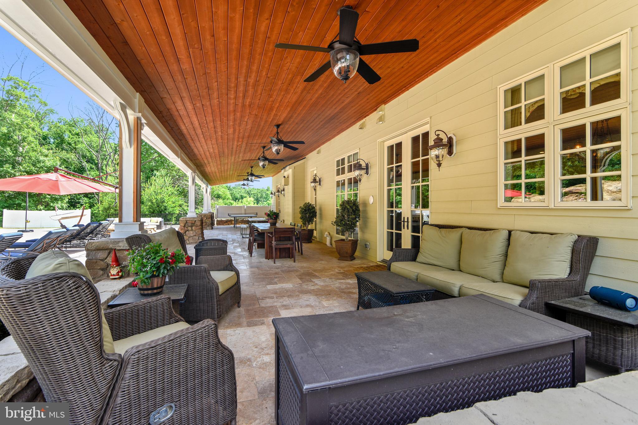 14416 Loyalty Road Leesburg, VA 20176 - Photo 24 of 61 Deep veranda for poolside relaxing