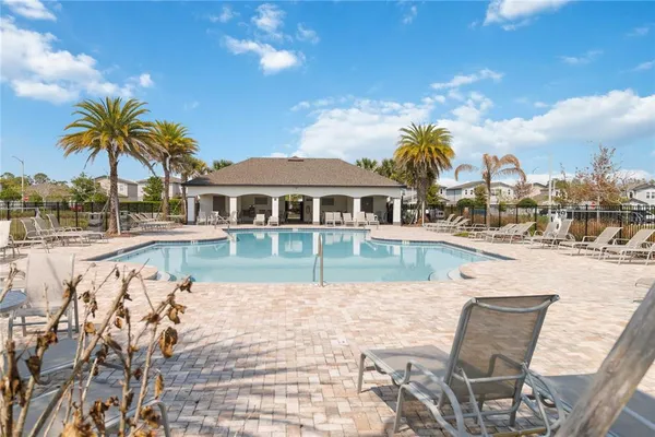 a view of a house with swimming pool