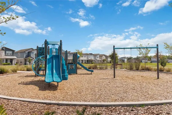 a view of a park with swings