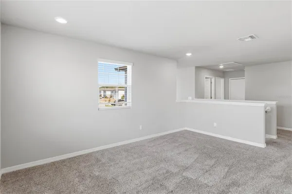 a view of a livingroom with furniture