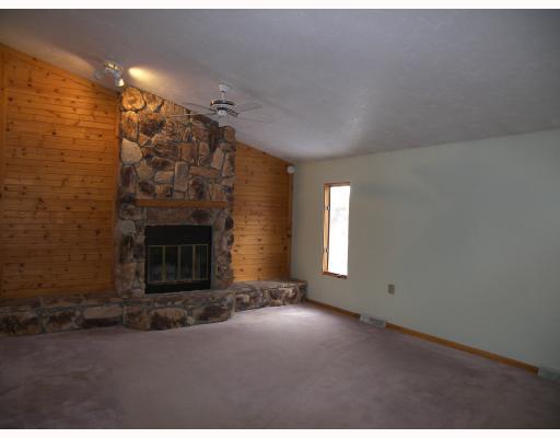 691 Armbrust - Hecla Road Mount Pleasant, PA 15666 - Photo 5 of 8 Exterior Front. Stone Wood Burning Firepalce with Wall to Wall Hearth, Open Floor Plan with View of Formal Dining