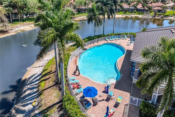 an aerial view of a house swimming pool and outdoor space