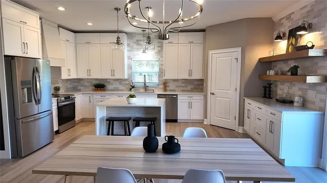 a kitchen with a sink and a window