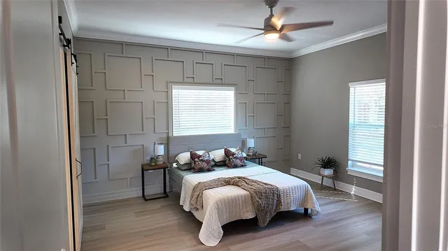 a room that has a bed and a window