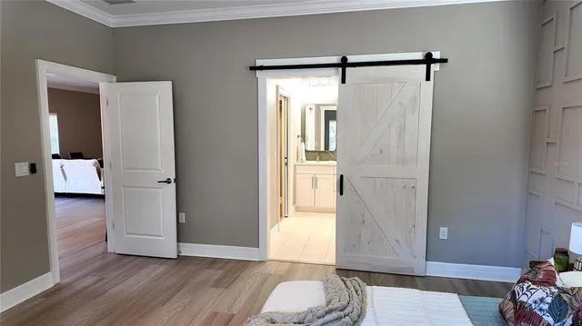 a bathroom with double vanity sinks and a mirror