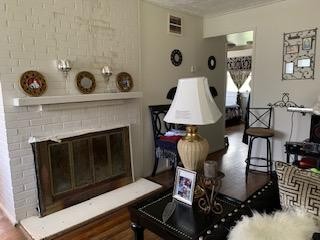 100 Temple Road Oak Ridge, TN 37830 - Photo 5 of 10 a living room with furniture and a fireplace