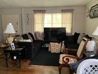 100 Temple Road Oak Ridge, TN 37830 - Photo 6 of 10 a living room with furniture fireplace and a window