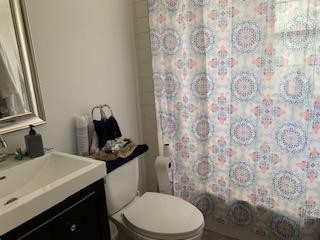 100 Temple Road Oak Ridge, TN 37830 - Photo 7 of 10 a bathroom with a toilet and sink