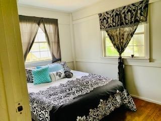 100 Temple Road Oak Ridge, TN 37830 - Photo 8 of 10 a bed sitting in a bedroom next to a window
