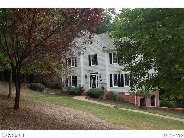 14331 Crossings Ridge Drive Midlothian, VA 23113 - Photo 1 of 12 a front view of a house with a yard