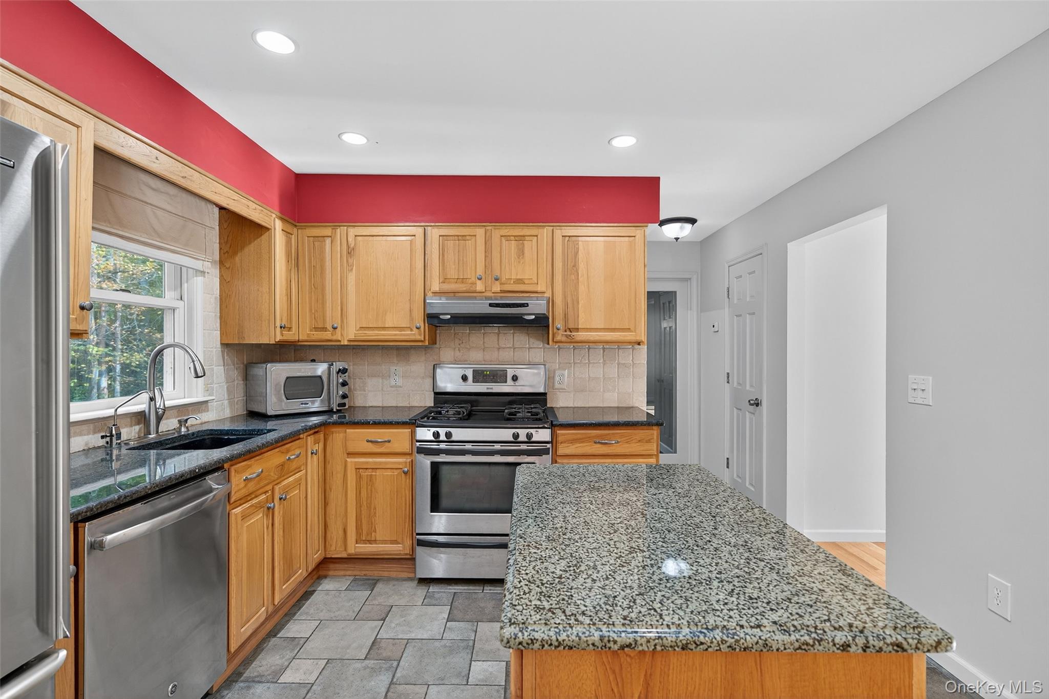 15 Nelson Road Monroe, NY 10950 - Photo 11 of 50 a kitchen with stainless steel appliances granite countertop a sink stove and refrigerator