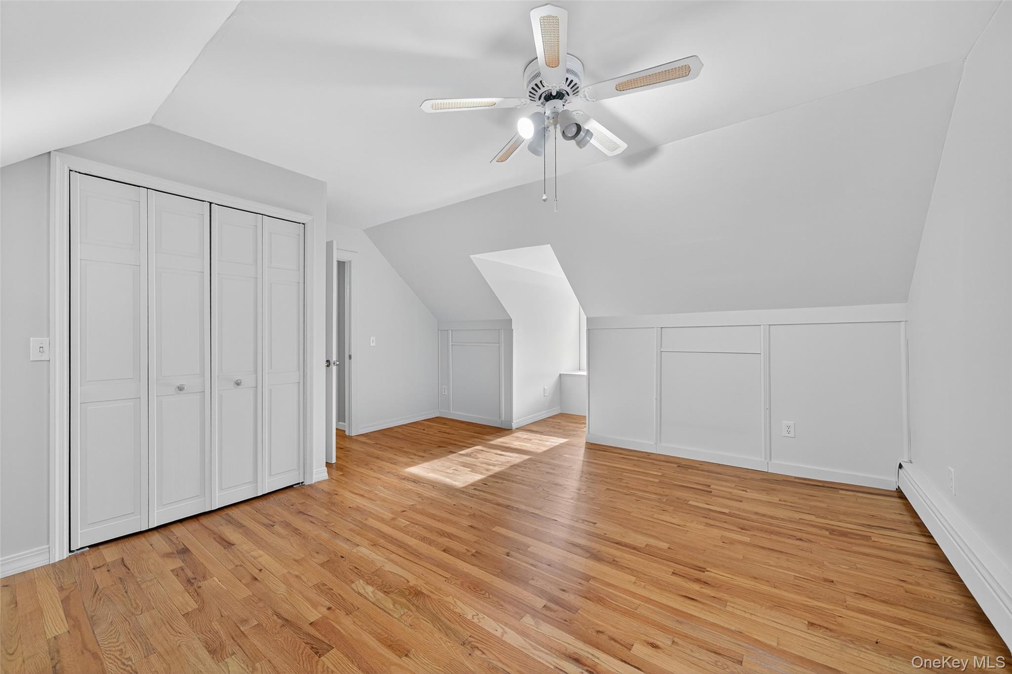 15 Nelson Road Monroe, NY 10950 - Photo 24 of 50 a view of an empty room with wooden floor